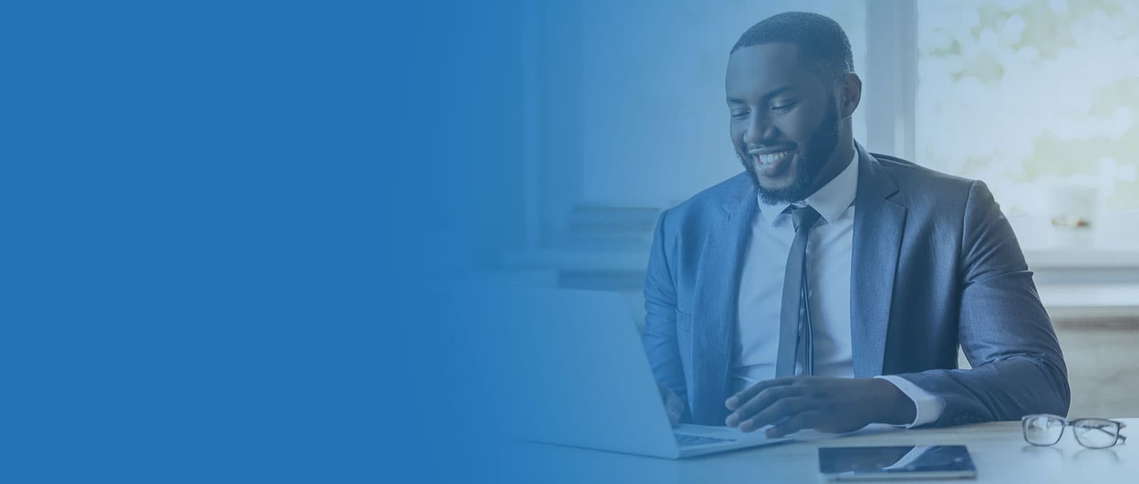 Property manager working on a laptop